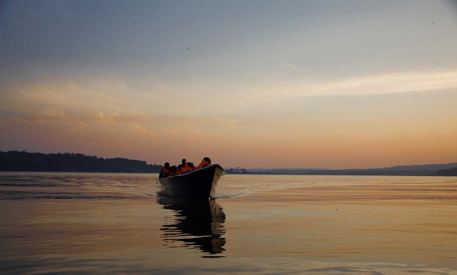 Boat to Lunkulu Island in sunset